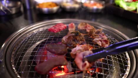 grilled pork and beef on a barbecue