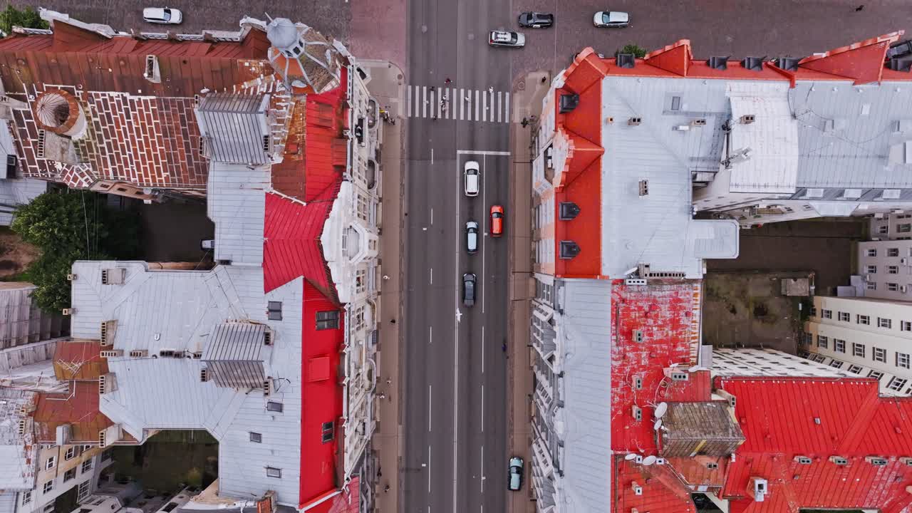 Aerial top down shot of Riga Latvia showing cars moving through old town streets