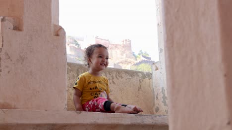 innocent child cute facial expression at outdoors at morning from flat angle