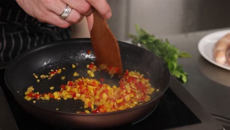 cooking peppers and onions