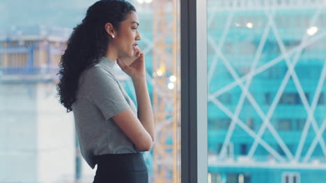 Window,-phone-call-and-business-woman-in-office