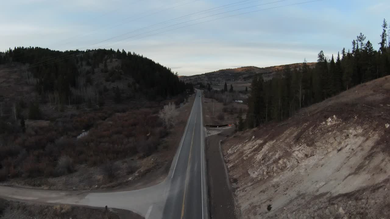 Aerial view of a road between nature
