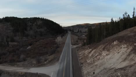 aerial view of a road between nature