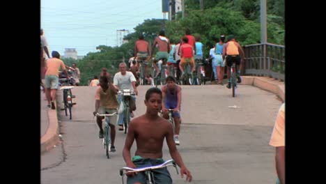 people ride bicycles in havana cuba in the 1980s