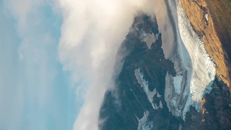 Vertical-4k-Timelapse,-Clouds-Above-Glacier-National-Park-Peaks-and-Valley-on-Sunny-Autumn-Day,-Montana-USA