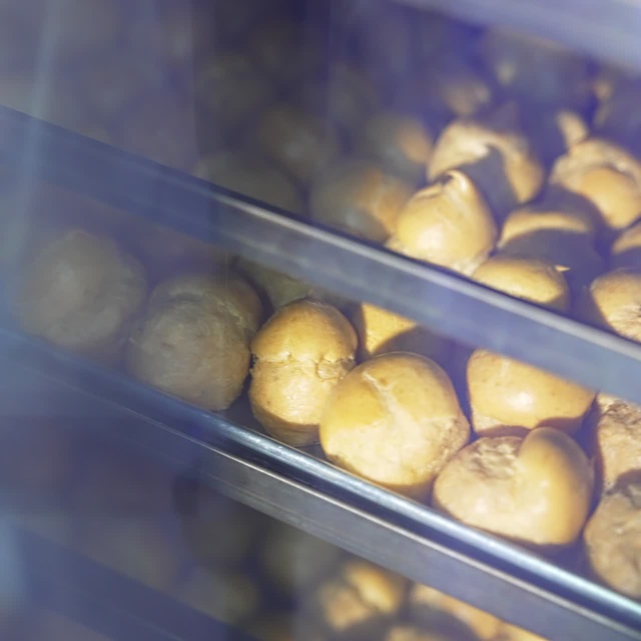 Pastry chef making tasty confectionery. Production of sweet bakery deserts