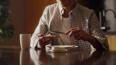 man having breakfast at home