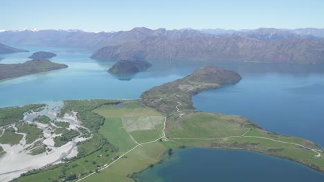 tilting up from the drone of the lakes to the sky