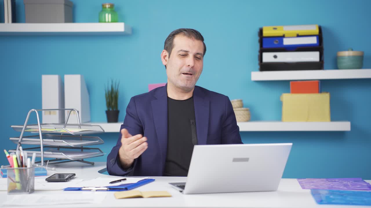 Businessman holding online meeting.