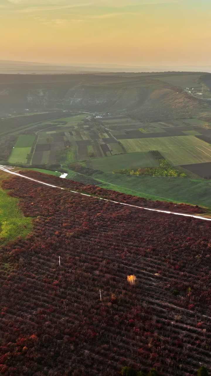Aerial drone view of the Old Orhei historical and archaeological complex in Moldova at sunset. Vertical