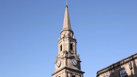 panning-shot-of-church-steeple-along-high-street-in-Inverness,-Scotland-in-the-Highlands