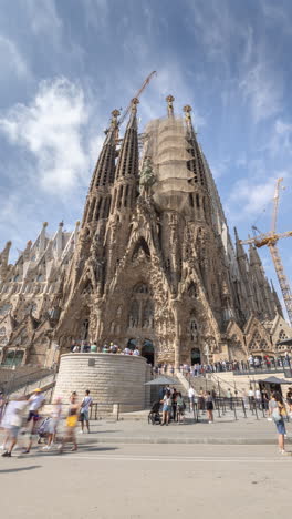 imelapse of the sagrada familia cathedral in barcelona in vertical