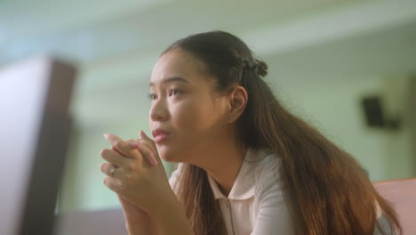 Portrait-Of-Young-Woman-Praying-Inside-The-Chapel