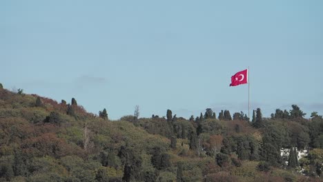 turkish flag on a hilltop