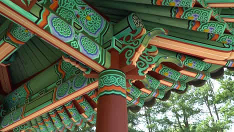 colorful painted roof of a shrine in tomb of seven hundred patriots in geumsan, south korea