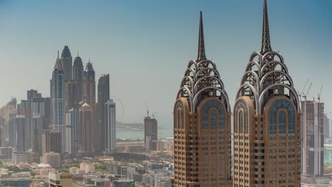 día soleado ciudad de dubai famoso centro de la ciudad torres techo panorama timelapse 4k emiratos árabes unidos