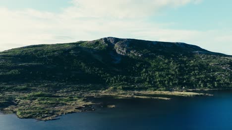 mountain and lake gurben in åfjord, trøndelag, norway - aerial drone shot