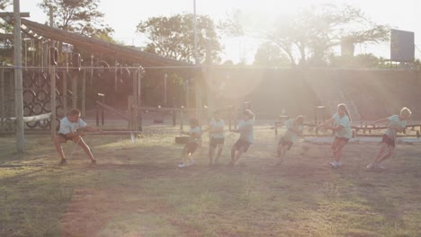 group of caucasian children training at boot camp