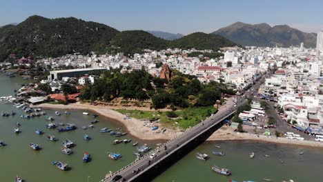 Ancient-hindu-temple-on-hill,-city-landscape-of-Nha-Trang,-Vietman