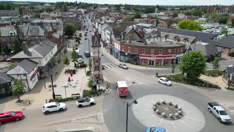 Clock-Tower-and-roundabout-Newmarket-town-Suffolk-UK-Aerial-drone,-aerial-view