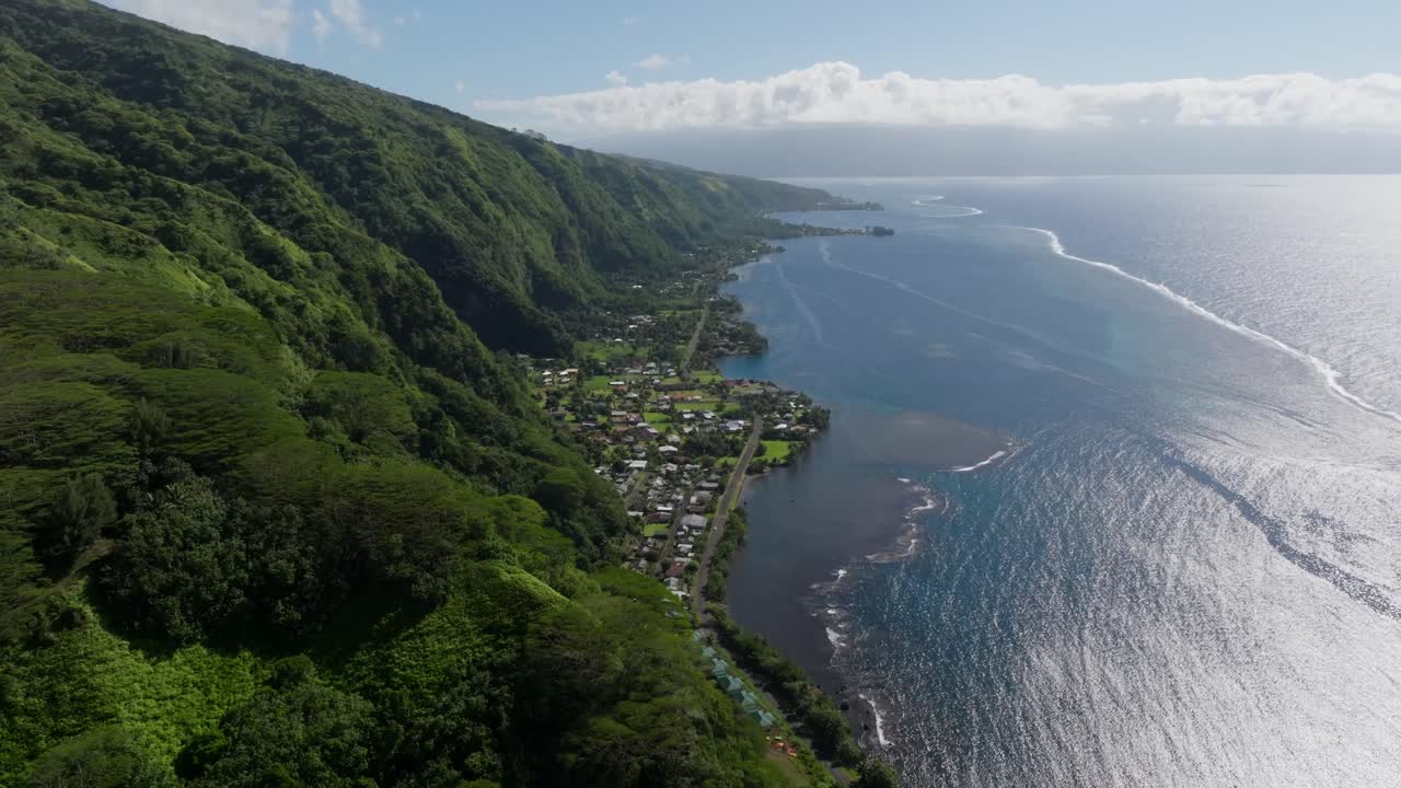 Drone view of the Tahitian coast on a partly cloudy day