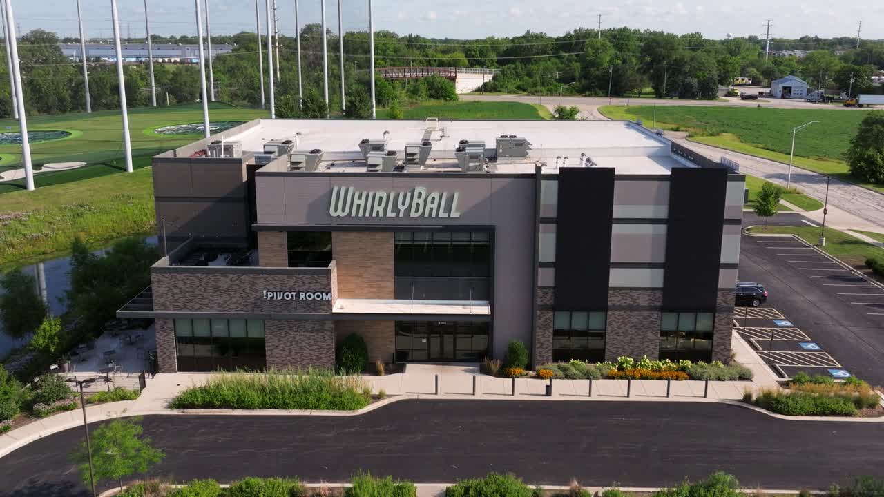 Frontal establishing view of WhirlyBall for recriation on sunny vibrant day