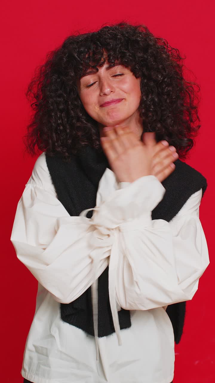 Caucasian young woman praying making wish asking hopeful help begging apology meditation imploring