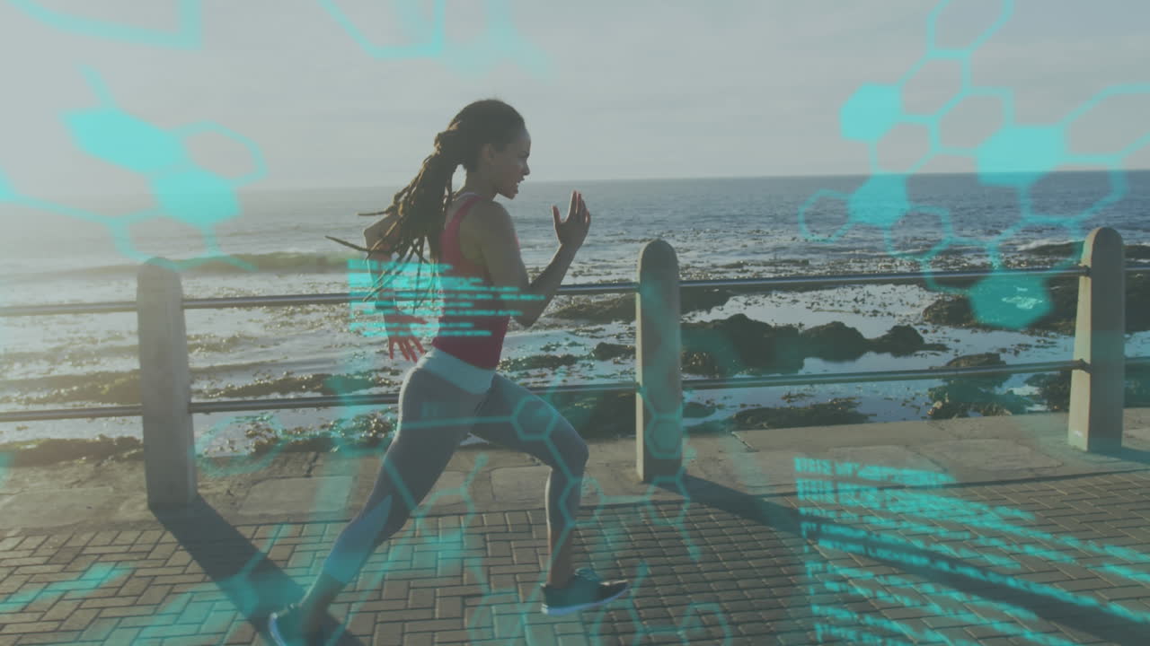 procesamiento de datos médicos contra la mujer afroamericana en forma corriendo en el paseo marítimo