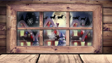 animación digital del marco de la ventana de madera contra la nieve que cae sobre la silueta negra de santa claus