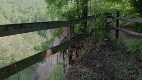 fence on edge of falling into canyon at providence canyon state park