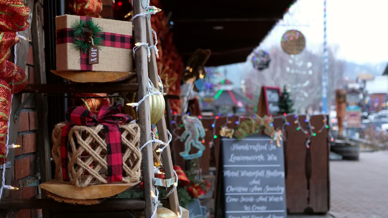 String wrapped present with plaid bow, bow decoration, people shopping and walking by - Holiday decoration - Small shoppe sign - people walking by