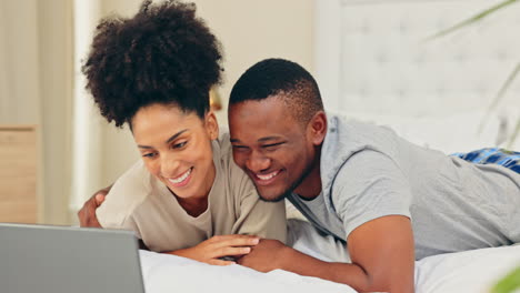 Laptop,-love-and-a-couple-watching-a-movie-in-bed