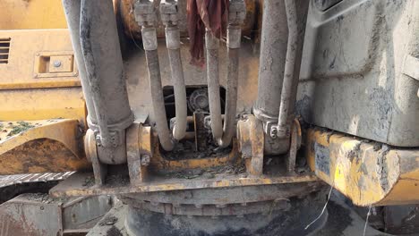 close up view of hydraulic hoses pipes of heavy industry machine