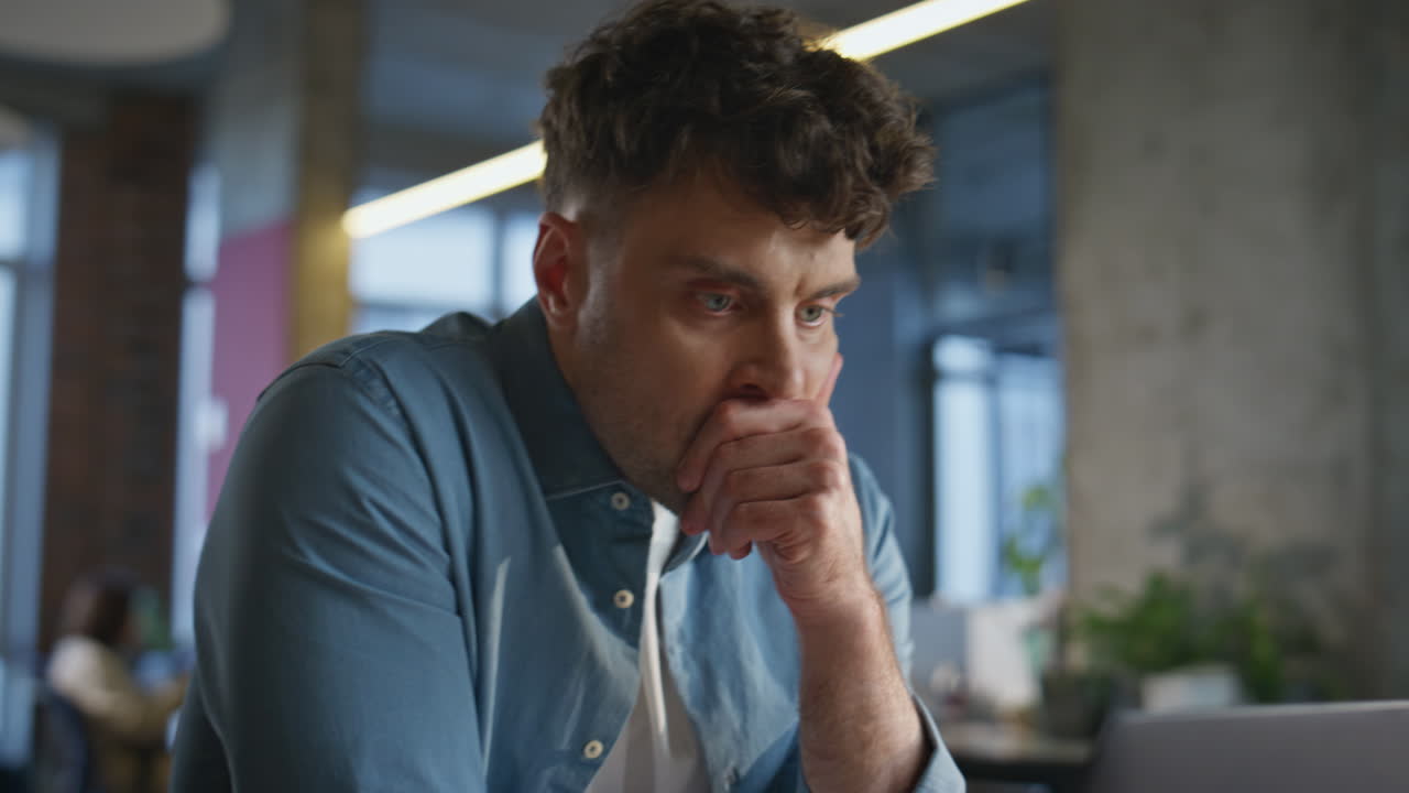 Accountant hands reviewing paperwork coordinating tasks on laptop alone closeup