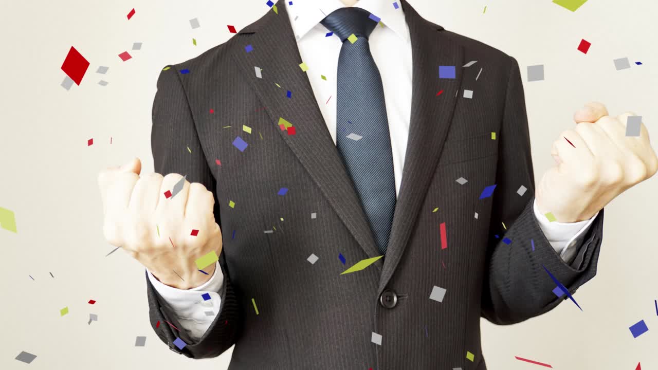 사업가와 공중에서 날아다니는 콘페티.