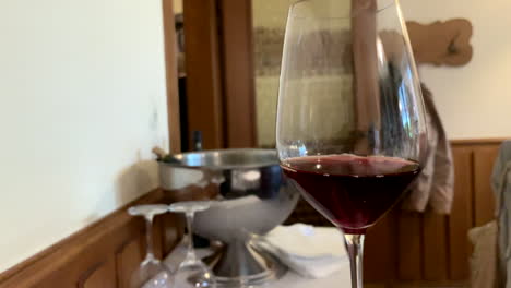 tasting a glass of red wine in the restaurant
