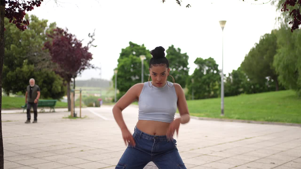 Woman dancing in a park