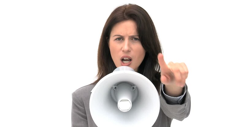 Woman shouting through megaphone
