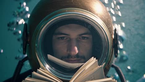 a diver reads underwater