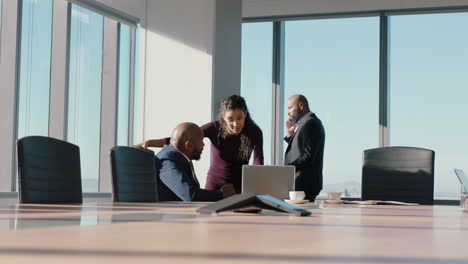 business-woman-team-leader-discussing-project-helping-colleague-using-laptop-computer-brainstorming-ideas-in-office-boardroom