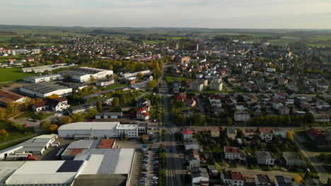 Morning-Sunlight-Over-The-Town-Of-Lubawa-In-Warmian-Masurian-Voivodeship,-Poland---aerial
