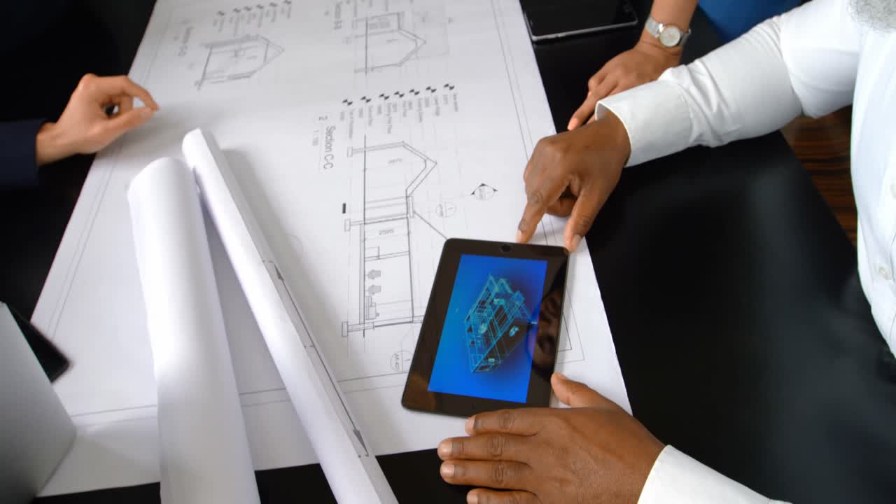 Executives discussing over blueprint in conference room 4k