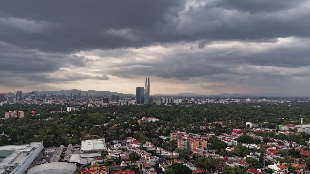 Aerial hyperlapse capturing late-day storm clouds in southern CDMX