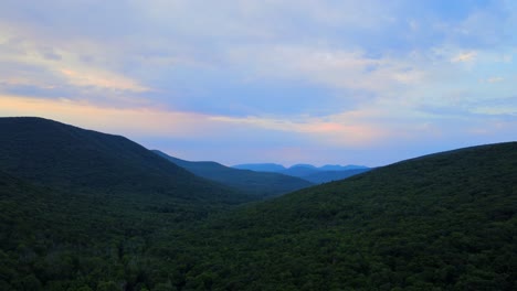 aerial drone video footage of the appalachian mountains during sunset during warm summer nights