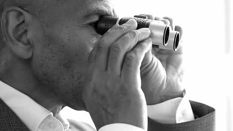 man looking through binoculars with white background with people stock video stock footage