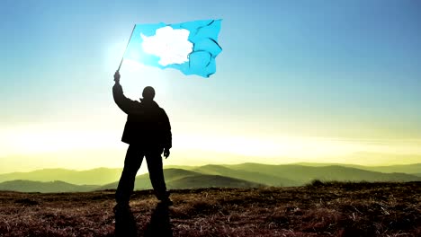 exitoso hombre silueta ganador agitando bandera de la antártida en la parte superior del pico de la montaña. fondo de bucle cinemagraph
