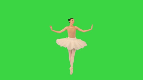 ballerina walking on tiptoes and waving hands on a green screen, chroma key