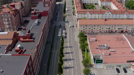 street lanes aerial road in central gothenburg swedish city sweden car driving horizon skyline architecture old historic buildings apartment offices sunny summer parking lot freeway heavy traffic bird