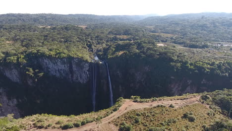 wonderful canyon and waterfall in aerial scene, south of brazil