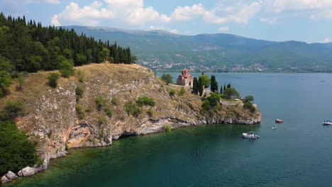 aerial drone view of the church of saint john the theologian on lake ohrid north macedonia